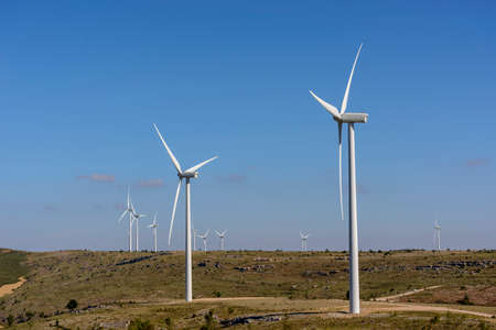 Wind turbines farm in line in Albacete Spainの写真素材
