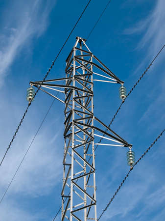 High Voltage Power line detail view on sunny dayの写真素材