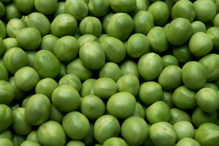 Fresh and healthy green peas background.の写真素材