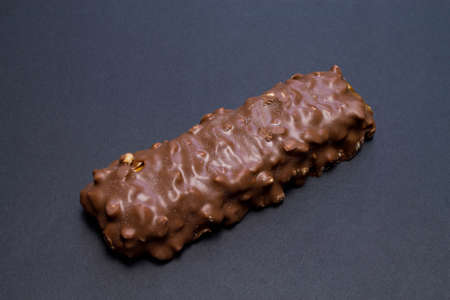 Delicious chocolate bar on black background.の写真素材
