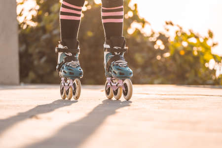 Skates during outdoor skating in the morning. Active lifestyle. Rollerblading