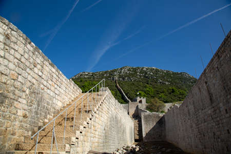 Medieval town of Ston in Croatia, with the second largest wall in the world made to stop the Ottomans. A small town that is now an oyster farmの写真素材