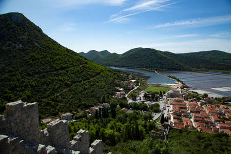 Medieval town of Ston in Croatia, with the second largest wall in the world made to stop the Ottomans. A small town that is now an oyster farmの写真素材