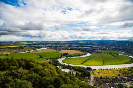 Meadows, graveyards, churches and iconic landmarks of the city of Stirling in Scotland