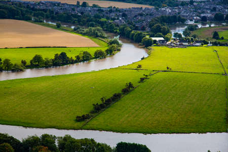 Meadows, graveyards, churches and iconic landmarks of the city of Stirling in Scotlandの写真素材