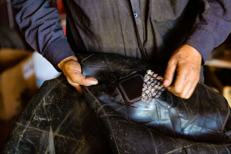 Fixing a wheel in repair shop