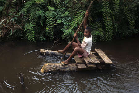 GUINEA ECUATORIAL. Continental  region .Monte Alen National Park ; Child raft.のeditorial素材