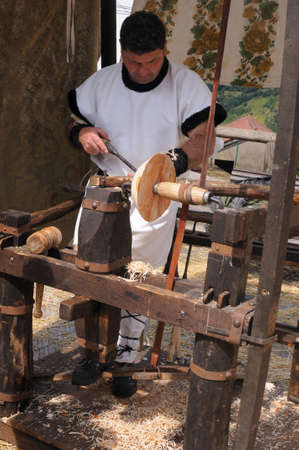 Manufacturing bowl lathe with birch wood  " Astur-Roman Festival of  La Carisa "  CARABANZO  Asturias SPAIN.のeditorial素材