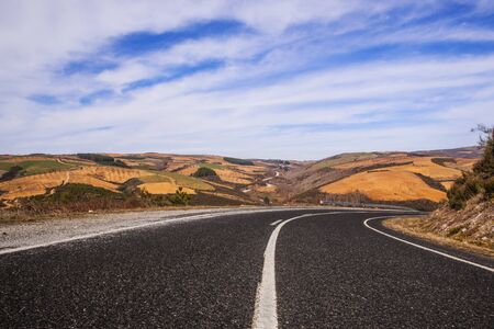 Asphalt road with dessert viewの写真素材