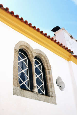 Portuguese Gothic window with double arc の写真素材