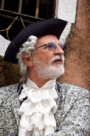 Unidentified man in costume at the Carnival Parade in Venice, Italy.の写真素材