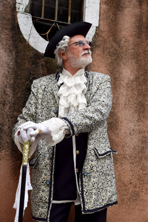 Unidentified man in costume at the Carnival Parade in Venice, Italy.の写真素材