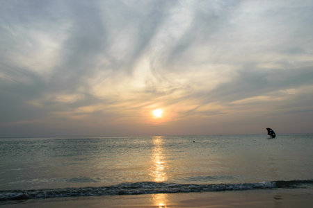 Man practicing kitesurf at the beachの写真素材