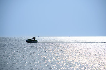 Man driving jet ski at the sea on holidaysの写真素材