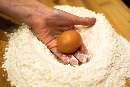 Close up of Pasta and Hands making home made Italian Pastaの写真素材