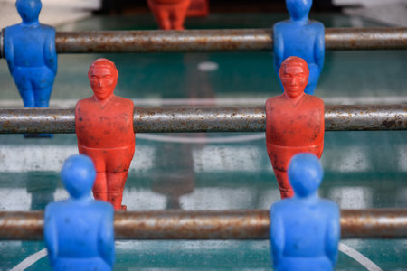 Red and blue plastic soccer and football figures for playing. Teamworking, Coworking, Team, Squad and Work in group concept.の写真素材