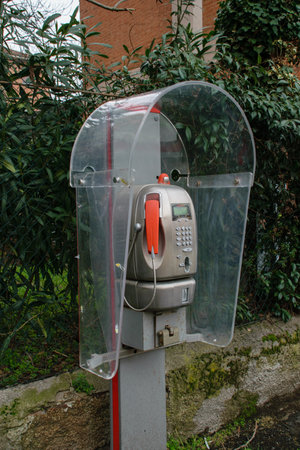 Grey public telephone cabinet on the streetの写真素材