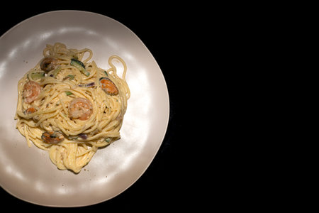 Seafood pasta Spaghetti with Prawns, Shellfish and zucchiniの写真素材