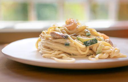 Seafood pasta Spaghetti with Prawns, Shellfish and zucchiniの写真素材