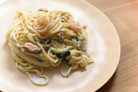 Seafood pasta Spaghetti with Prawns, Shellfish and zucchiniの写真素材
