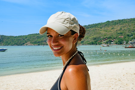 Gorgeous Lebanese young woman smiling and enjoying on beachの写真素材