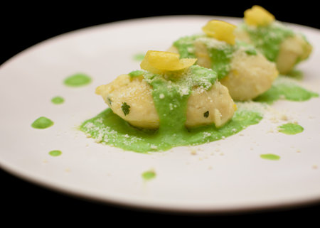 Gnocchi with potato and ricotta served with pestoの写真素材