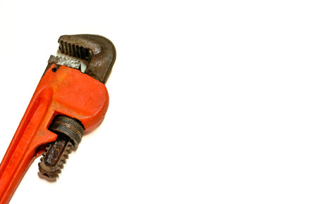 Red color spanner in isolated white backgroundの写真素材