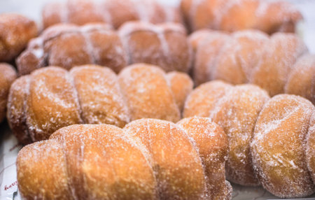 Freshly made pastries exposed in business for consumptionの写真素材