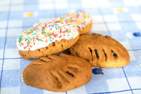 Image of Freshly made Tea pastries exposed in blue table background