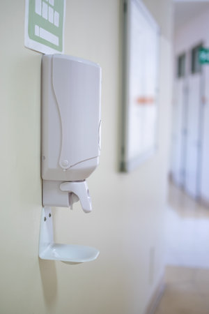 Image of disinfectant gel dispenser on hospital wall as antiviral and bacterialの写真素材