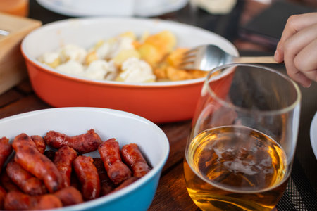 Close up image of traditional Tapas gastronomy in Spain on a terrace with beerの写真素材