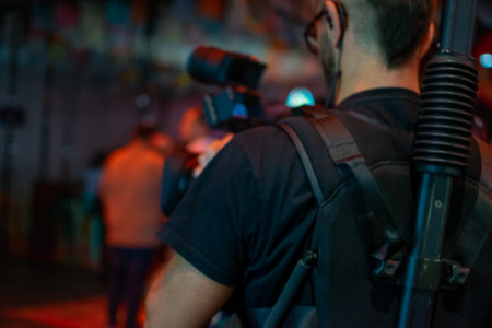 Camera man or Videographer Holding and recording with Professional Video Camera