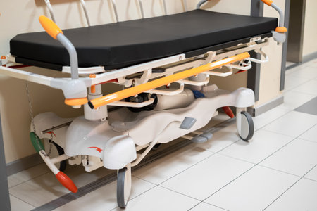 Close up view of Hospital bed or stretcher with background of corridorの写真素材