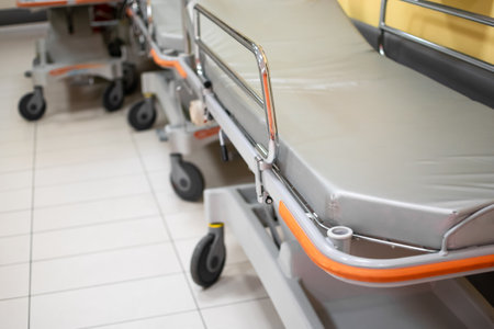 Paramedic Hospital bed or stretcher with blurred background of corridor on ground floorの写真素材