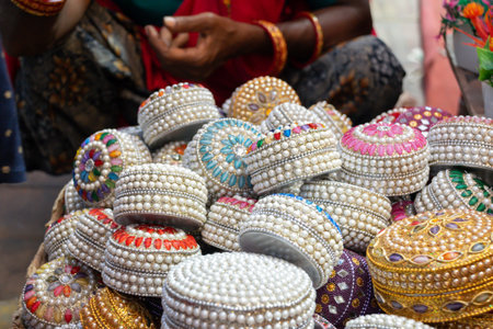 Bright jewelry boxes with different colors in street markets in New Delhi.の写真素材