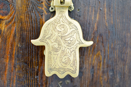 Fatima hand golden door knob at Marrakech medina and soukの写真素材