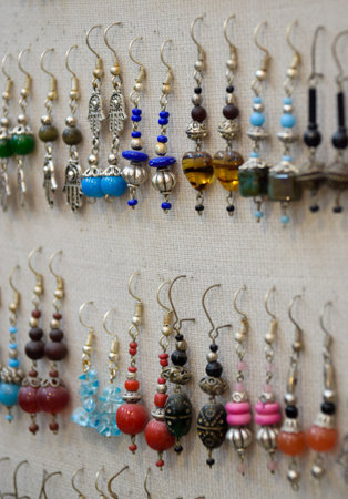 Lot of Earrings in different colors and shapes exposed in local market at Marrakechの写真素材