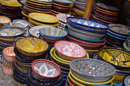 Decorative handcrafted plates displayed in a souvenir shop in Marrakech.の写真素材