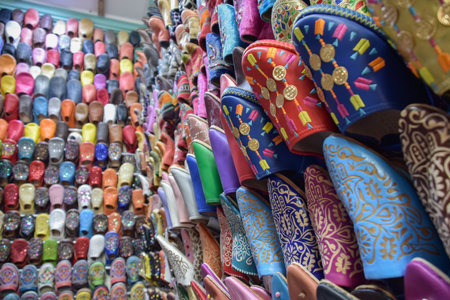 Close angle view Slippers or sandals of many colors hung from street stallsの写真素材