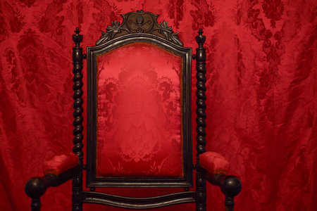 Medieval Red Throne Exposed with a Velvet Red Background. Segovia, Spain.の写真素材