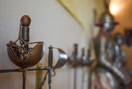 Close view Medieval Sword Exposed with White Background of Castle and Armorの写真素材