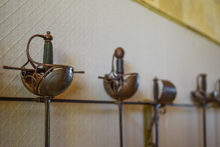 Set of Medieval Swords Exposed with a White Backgroundの写真素材