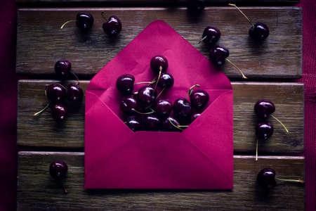 cherry still life in an envelopeの写真素材