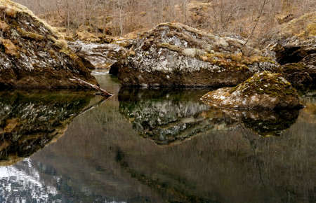 River calm streem in winter rocky lanscape, Norway                               の写真素材