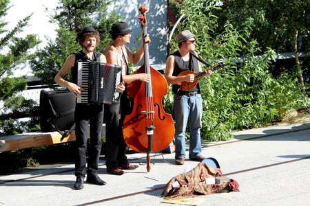 NEW YORK CITY - SEPTEMBER 03  Performers at High Line Park in NYC on September 03th, 2013  The High Line is a public park built on an historic freight rail line elevated above the streets on Manhattan West Side      のeditorial素材