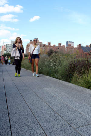 NEW YORK CITY - SEPTEMBER 03  People at High Line Park in NYC on September 03th, 2013  The High Line is a public park built on an historic freight rail line elevated above the streets on Manhattan West Side      のeditorial素材