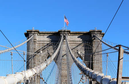 New York City, Famous historic Brooklyn Bridge in Manhattan over Hudson River.の写真素材