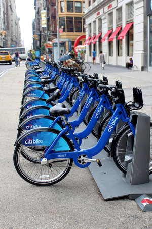 NEW YORK -  SEPTEMBER 02: Citi Bike docking station on September 02, 2013 in New York. Citi Bike is a privately owned for-profit public bicycle sharing system, intended to provide people with an additional transportation option for getting around New Yorkのeditorial素材