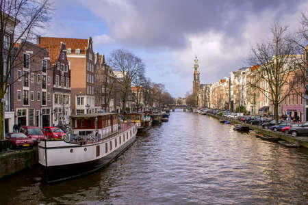 View of one of the Unesco world heritage famous city canals (Prinsengracht) of Amsterdam, The Netherlands.のeditorial素材