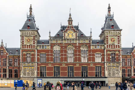 AMSTERDAM - FEBRUARY 07, 2015: Central Station on February 07, 2015 in Amsterdam. Central Station is the central railway station of Amsterdam and is used by 250,000 passengers a day.のeditorial素材
